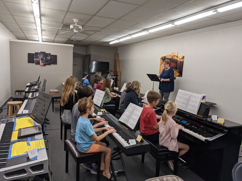 DVMTA Cavalcade students rehearsing together on pianos