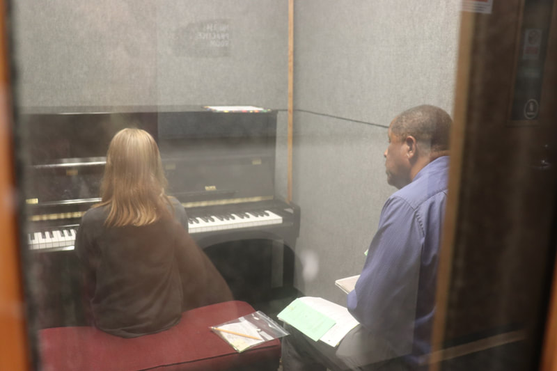 DVMTA teacher evaluating a piano student
