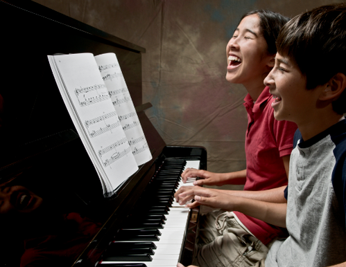 Cavalcade duet children at piano